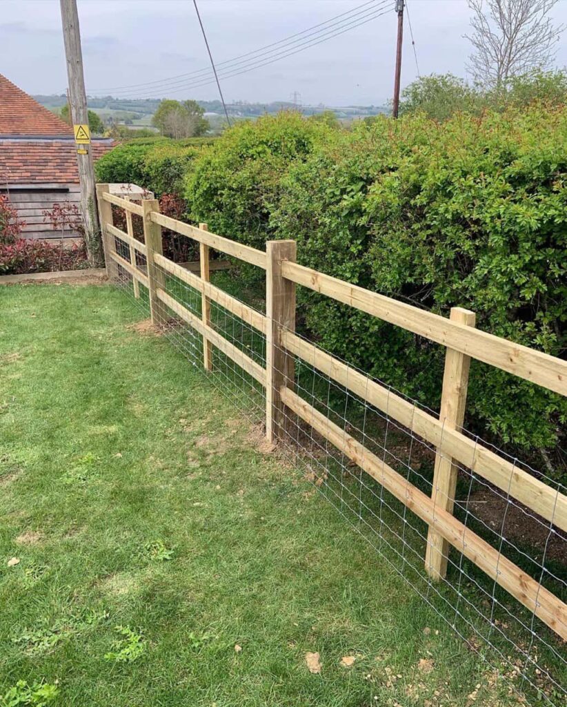 This is a photo of a picket fence and picket gate installed by Fast Fix Fencing Necton